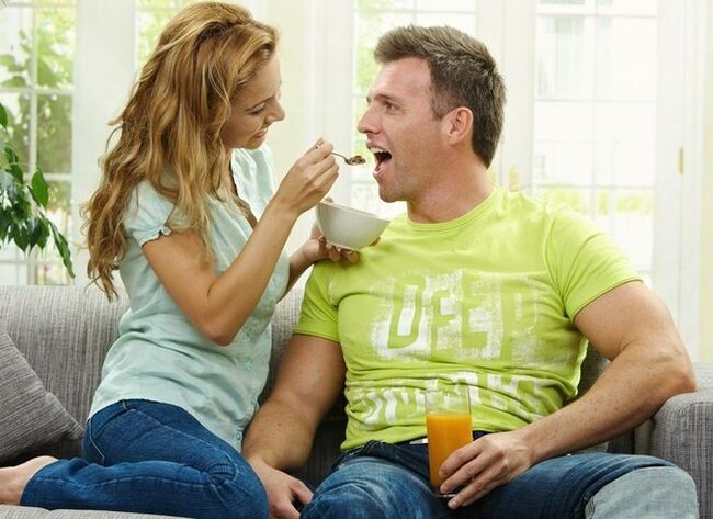 a woman gives a man products to increase his potency
